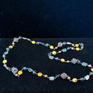 Chic Beaded Necklace with Purple, Gold, and Silver Accents